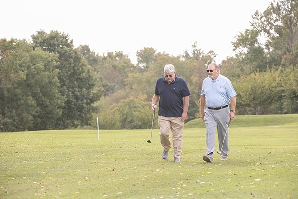 Men walking and Golfing