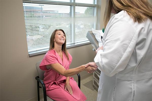 doctor and patient shaking hands